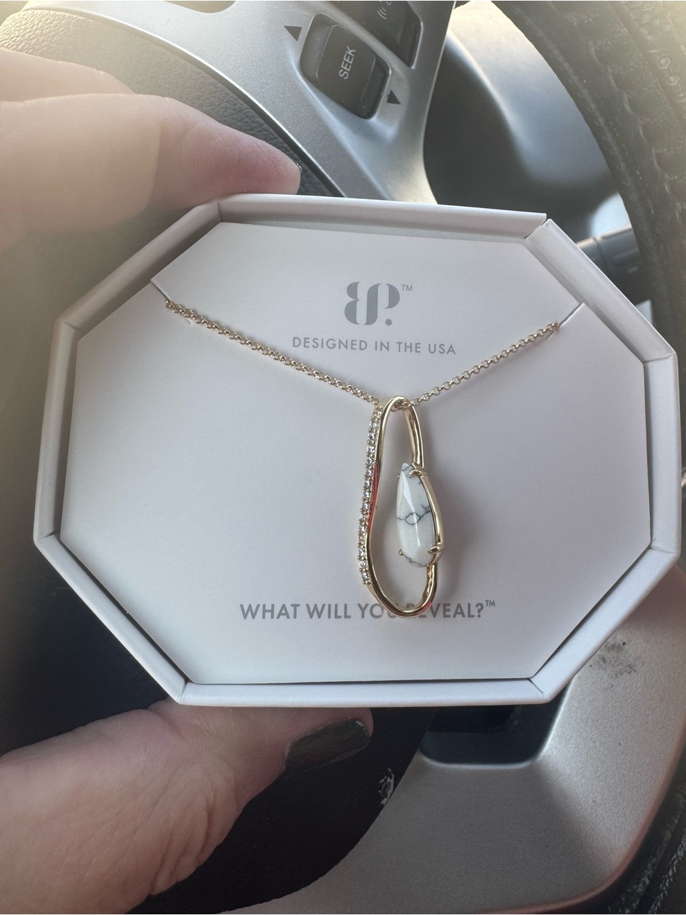 Gold Teardrop Pendant Necklace with White Stone